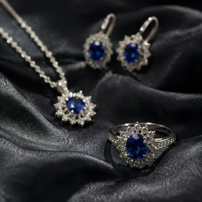Elegant Sapphire Jewelry on Charcoal Satin