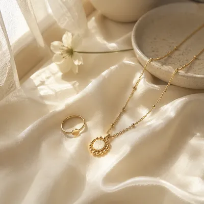 Elegant Gold Jewelry on Ivory Silk