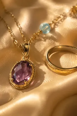 Elegant Gold Jewelry on Beige Silk