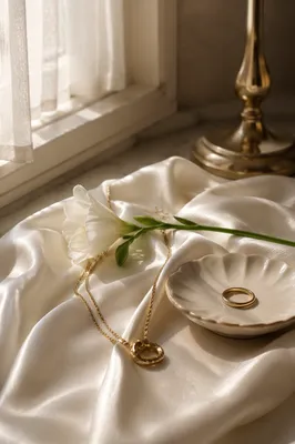 Elegant Gold Jewelry on Ivory Silk