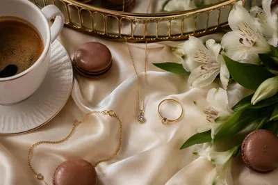 Elegant Gold Jewelry on Ivory Satin