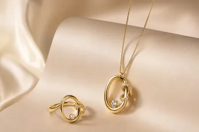 Elegant Gold Necklace and Ring Still Life