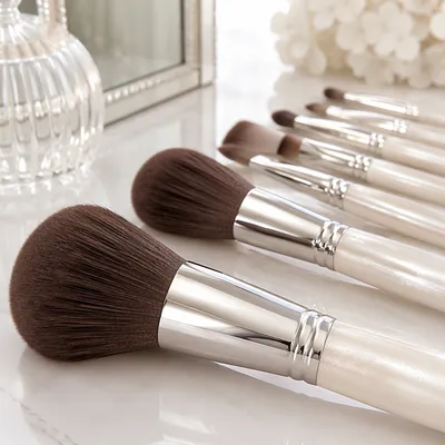 Luxury Makeup Brushes on White Vanity