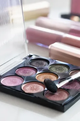 Close-Up Makeup Palette on White Vanity