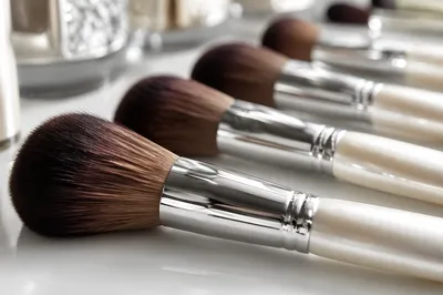 Luxury Makeup Brushes on White Vanity
