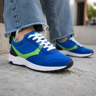 Cobalt Retro Sneakers on Concrete Patio