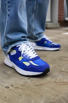 Cobalt Retro Sneakers on Concrete Patio