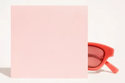 Coral Sunglasses Behind Blush Pink Card