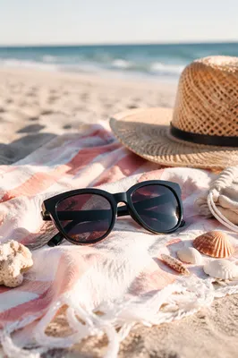 Chic Sunglasses on Beach Towel