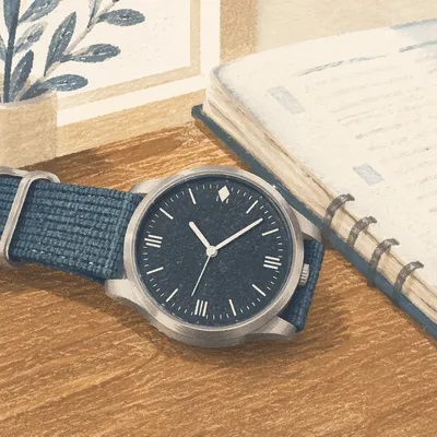 Close-Up Wristwatch on Wooden Desk