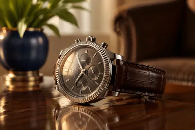 Luxury Wristwatch on Glossy Wooden Table