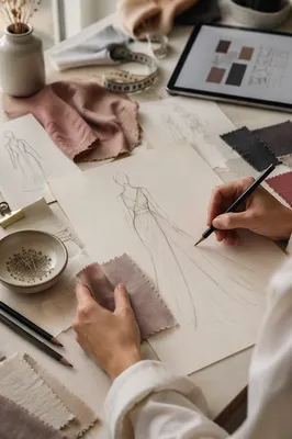 Fashion Design Sketches on Studio Table