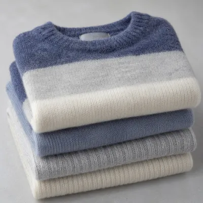 Folded Cashmere Sweaters in Soft Neutral Tones