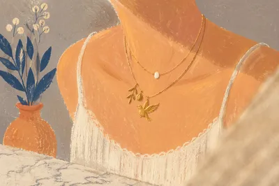 Elegant Gold Necklace on Marble Vanity