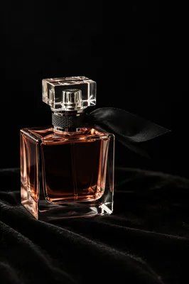 Elegant Perfume Bottle on Black Velvet