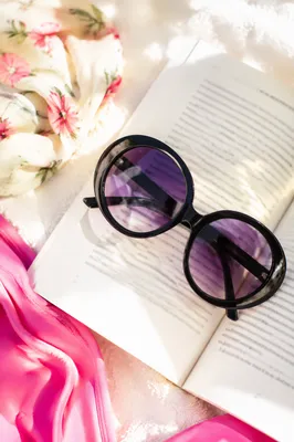 Vintage Sunglasses on Open Book Summer Still Life