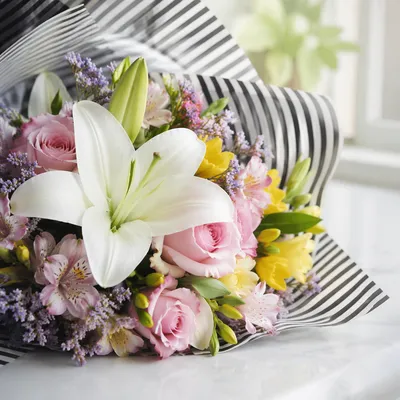 Colorful Fresh Bouquet on White Tabletop