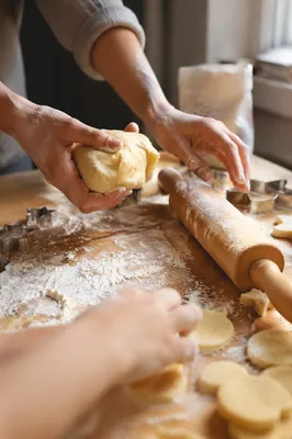 Hands Preparing Cookie Dough in Kitchen