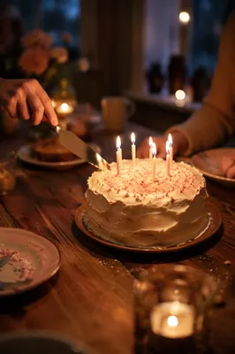 Candlelit Homemade Birthday Cake Close-Up