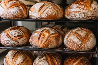 Fresh Artisan Bread on Bakery Racks
