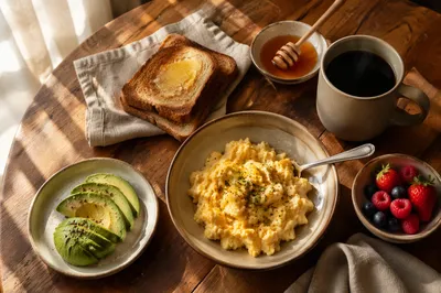 Sunlit Breakfast Spread with Eggs and Coffee