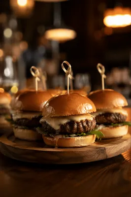 Gourmet Mini Burgers on Wooden Board