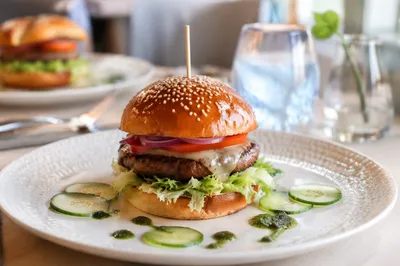 Gourmet Burger on Elegant Restaurant Plate