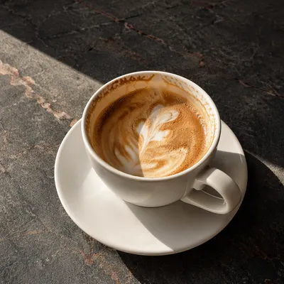 Morning Latte Art on Cafe Table