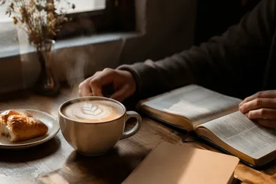 Morning Latte and Pastry on Wooden Table