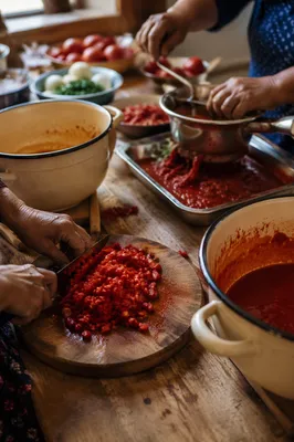 Hands Preparing Vegetables for a Shared Meal