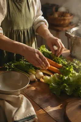 Hands Preparing Vegetables for Shared Meal