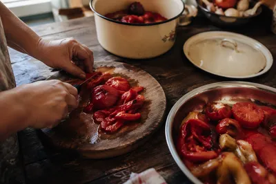 Rustic Hands Preparing Vegetables for Shared Meal