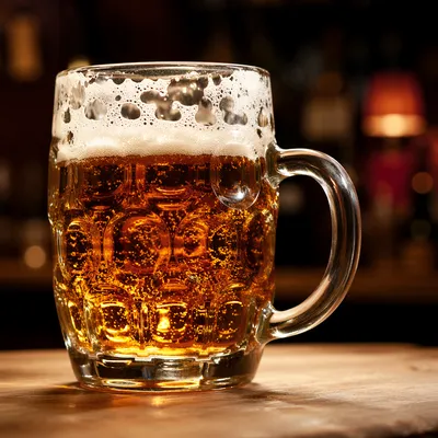 Amber Craft Beer Mug on Pub Bar