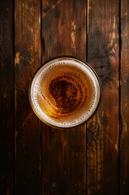 Amber Craft Beer on Rustic Pub Table
