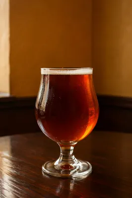 Amber Craft Beer on Wooden Pub Table