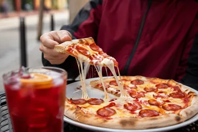 Fresh Pepperoni Pizza Slice with Melted Cheese