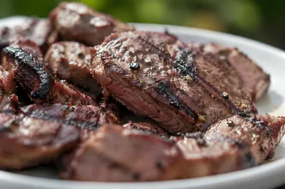 Grilled Steak Slices on White Dinner Plate