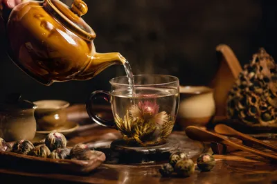 Cozy Ceramic Teapot Pouring Blooming Tea