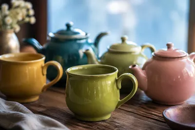Cozy Ceramic Tea Cups on Rustic Table