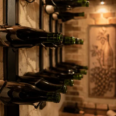Rustic Wine Bottles in Cozy Cellar Rack