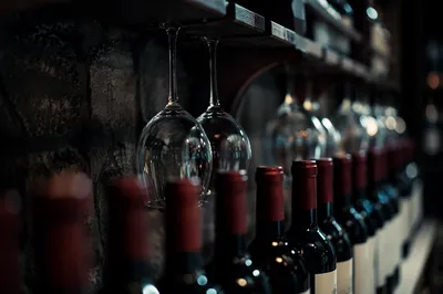 Moody Wine Cellar Glasses and Red Bottles