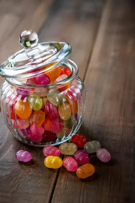 Colorful Candy Jar on Rustic Countertop