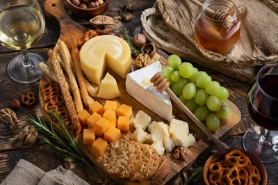 Rustic Cheese Board with Grapes and Honey