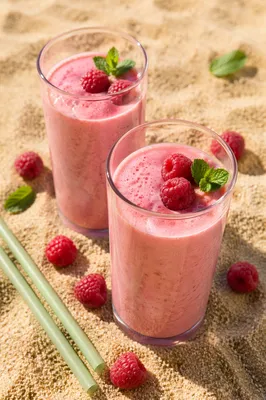 Blush Berry Cocktails on Warm Beach Sand