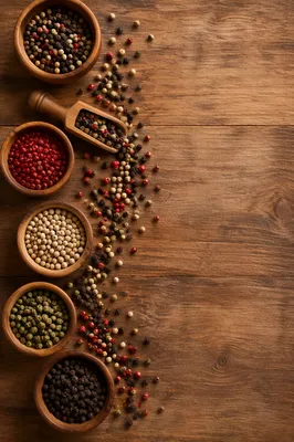 Colorful Peppercorn Spices on Rustic Wood