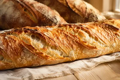 Fresh Baguettes on Rustic Linen Cloth
