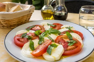 Fresh Caprese Salad on Outdoor Café Table