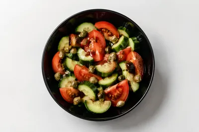 Fresh Vegetable Salad in Black Bowl