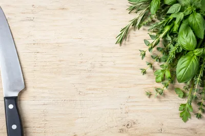 Fresh Garden Herbs on Wooden Cutting Board