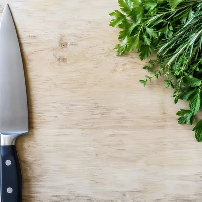 Fresh Garden Herbs on Wooden Cutting Board